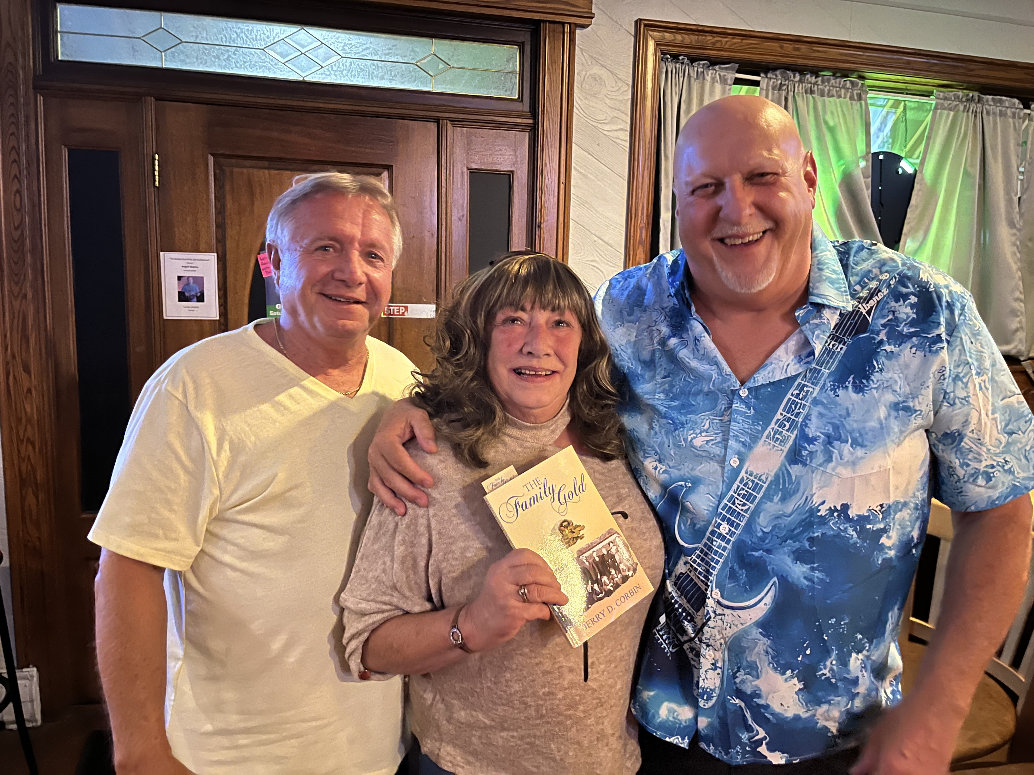 Friends celebrating The Family Gold