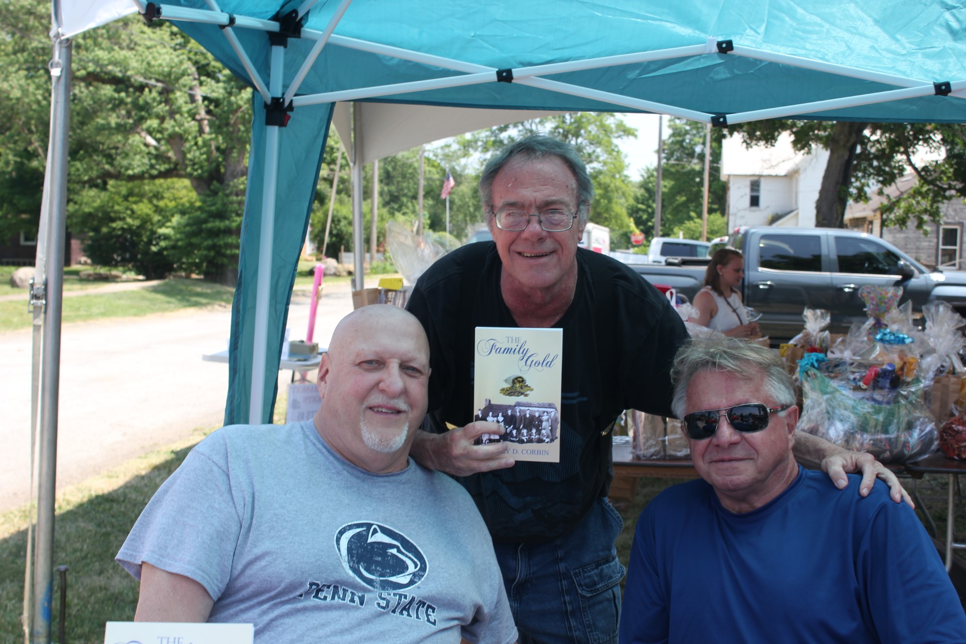 Readers with The Family Gold at an outdoor event